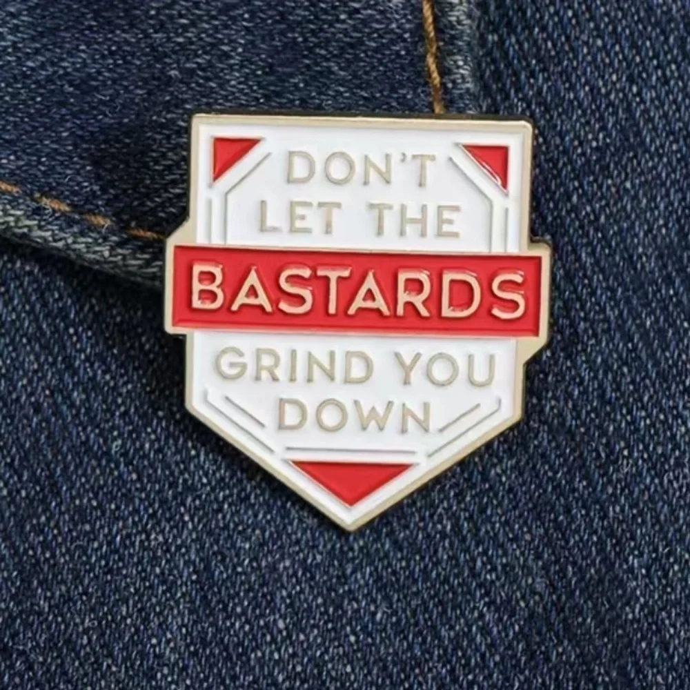 3/$25 “Don’t Let the B*stards Grind You Down” Pin Badge Brooch